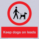 dogs-on-lead-symbol-with-black-text-on-white-background~